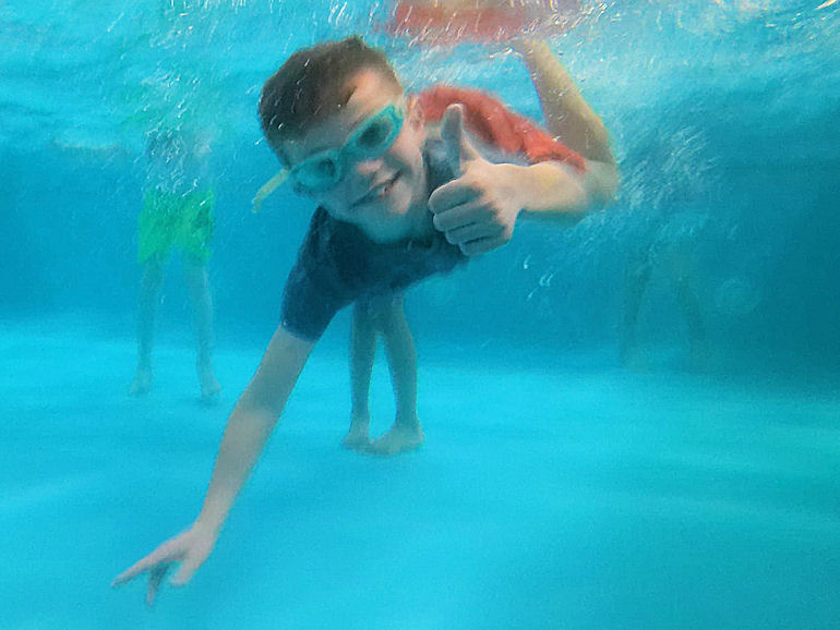 A Tenacres pupil swimming underwater