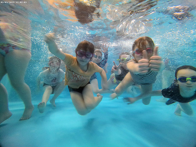 Tenacres pupils swimming underwater